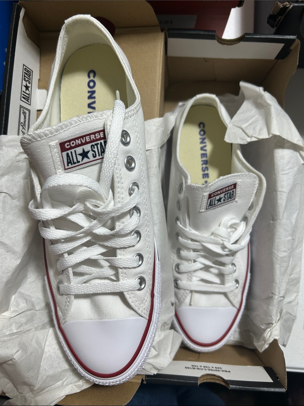 Converse men's White Low Top Sneakers with Red Trim